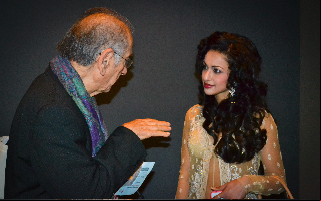 . Sikandar Sinha gestures hypnotically during discussion with enchanted actress Madhuri Bhattacharya